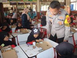 Polres Lamsel Gelar Program Makan Bergizi Gratis di SDN 2 Way Lubuk